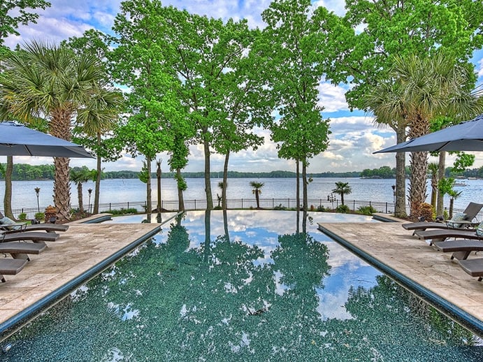 The standout feature of the property is arguably its infinity saltwater pool, which stretches out towards the lake. Photograph: Ivester Jackson