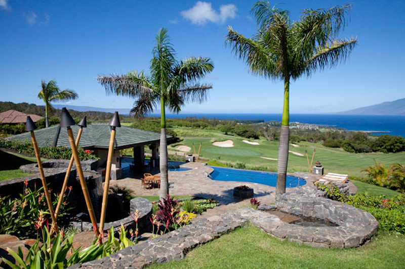Completed in 2008 and situated on 2.13 spectacular acres, this home has more than 6,000 square feet of living space and is offered fully furnished. A separate one-bedroom Ohana (guest house) provides staff or guest quarters. A pool, spa, personal putting green, and easy beach access are just a few of the amenities this spacious tropical home has to offer. Completed in 2008 and situated on 2.13 spectacular acres, this home has more than 6,000 square feet of living space and is offered fully furnished. A separate one-bedroom Ohana (guest house) provides staff or guest quarters. A pool, spa, personal putting green, and easy beach access are just a few of the amenities this spacious tropical home has to offer.