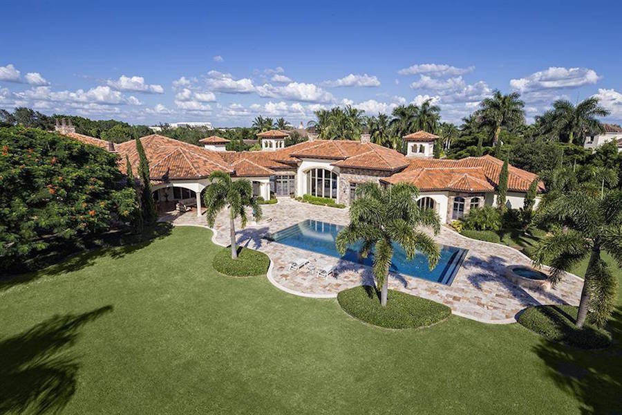 Featuring exclusive access to one of South Florida’s best golfing communities, this luxurious estate with vast manicured gardens offers all the amenities of the Bay Colony Golf Club, plus privacy and seclusion.