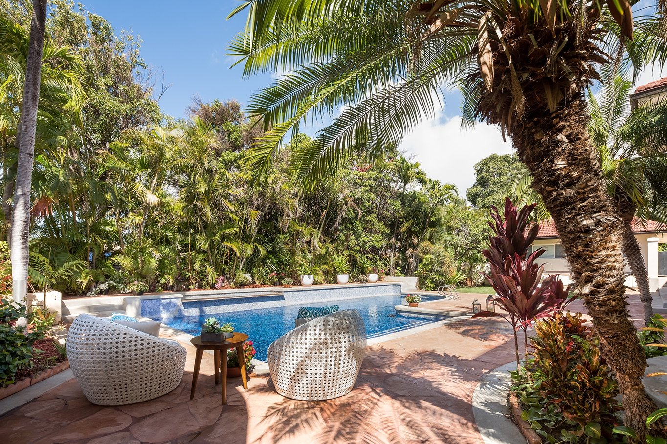 Lush plantings enhance the gorgeous exteriors with the additional benefit of heightened privacy. Photograph: Mark Singer Photography