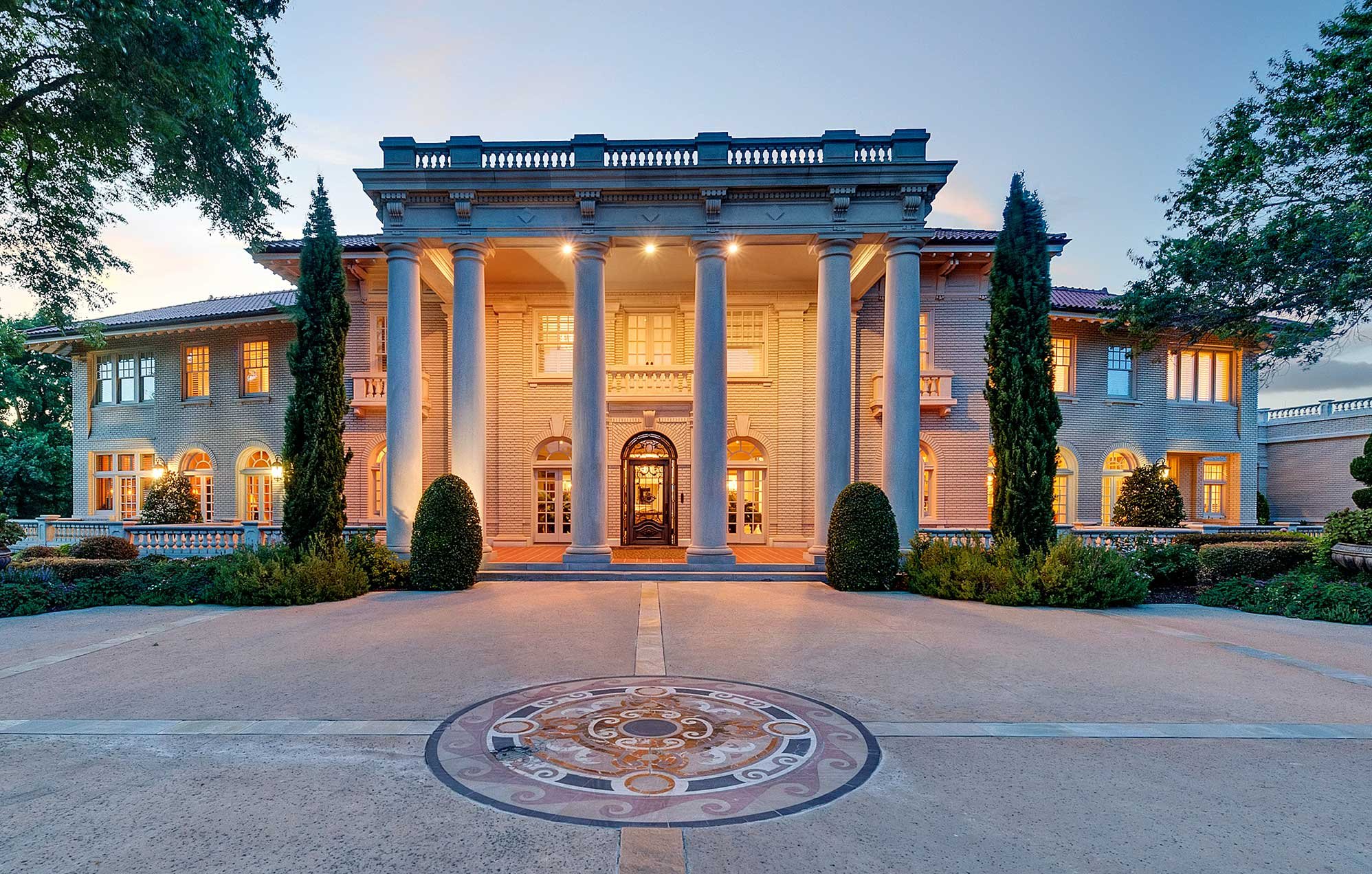 The Baldridge House, a magnificent 1.5-acre estate in Fort Worth, has a multi-vehicle garage facility with a car lift, workshop, and wash bay.