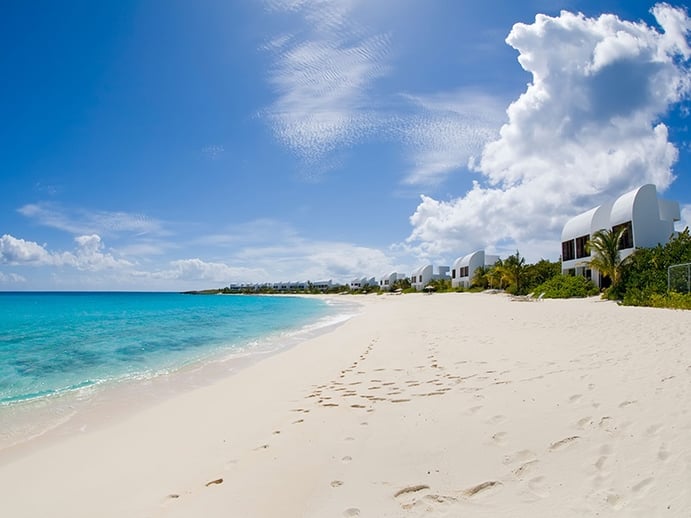 The Covecastles villas along Shoal Bay West are located between a lagoon and the channel overlooking the island of Sint Maarten/Saint-Martin. Photograph: Alamy. Banner image: Crocus Bay. Photograph: Shutterstock