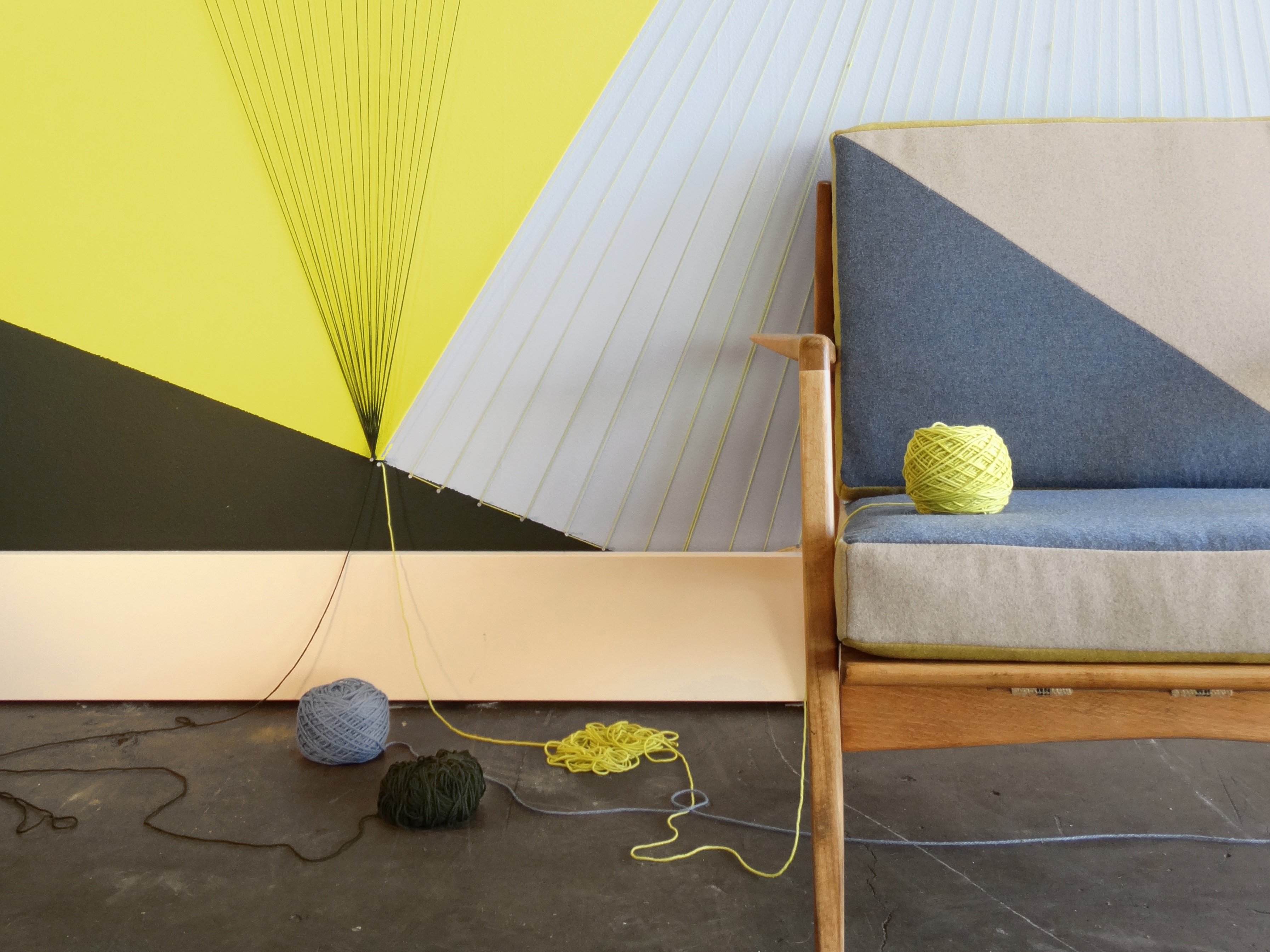 Design experts from Colorhouse suggest using a paint brush, hammer, and yarn for its consonance/dissonance trend.
