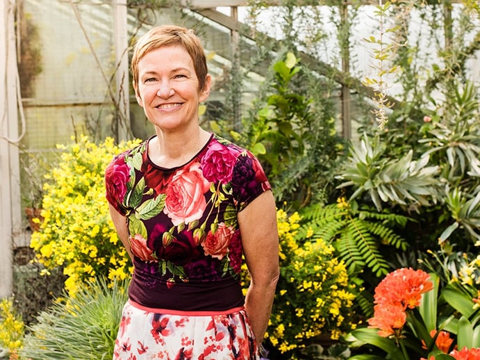 Elisabeth Condon, photographed exclusively for <i>Christie’s International Real Estate</i> magazine, at Wave Hill, a public garden and cultural center in New York City, where she recently held a residency. Photograph: Laura Barisonzi. Banner image: <i>Quit Safari</i>, 2016. Acrylic, ink, and glitter on linen, 47 x 151 inches. Courtesy Emerson Dorsch Gallery, Miami, Florida/Phillip Reed