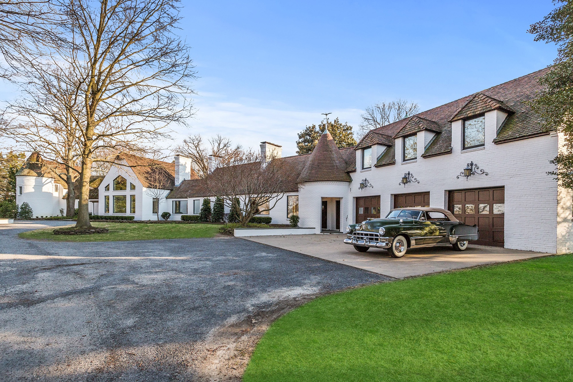 Featuring a 55-plus-car auto barn and a Bailey Marine-built dock on Chesapeake Bay, this magnificent waterfront estate is a dream home for car collectors and boaters alike.