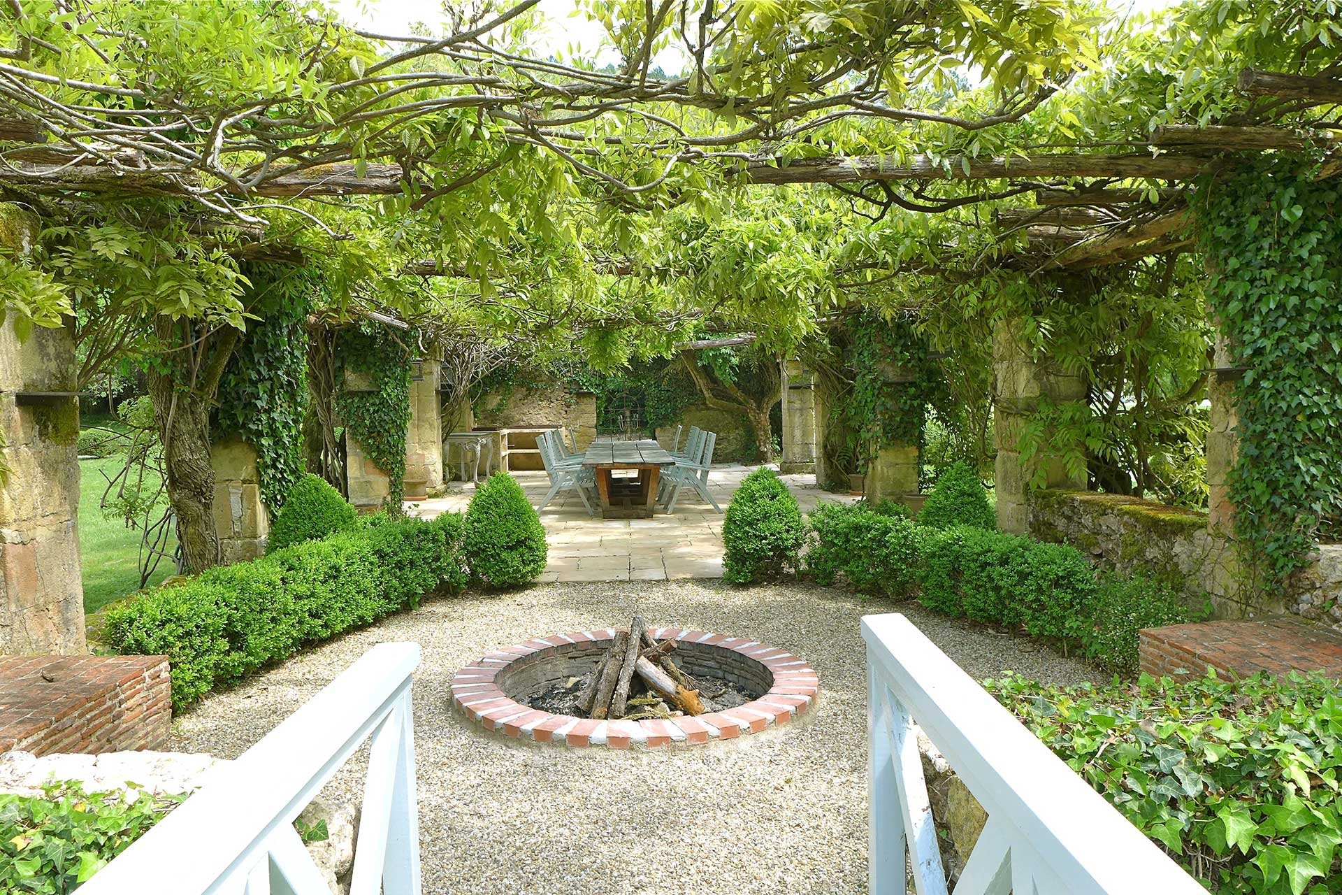 This 182-acre château estate in the Perigord region of the Dordogne features a courtyard garden with a dining terrace and fire pit from which to enjoy delightful summer evenings.