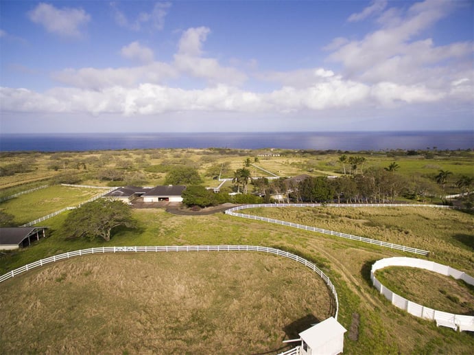 One of the few true equestrian estates on the Big Island, this elegant Puakea Bay Ranch home combines the best of resort and rural lifestyles.