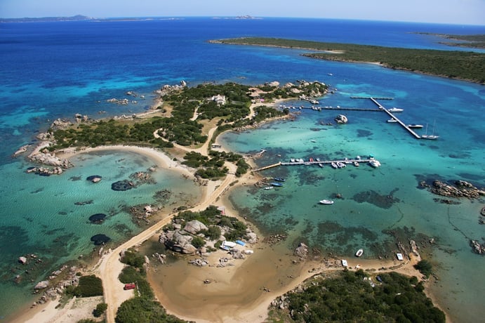 White-sand beaches, hidden coves, juniper gardens, and multiple dwellings are among the delights awaiting the new owner of this isle on the Costa Smeralda. White-sand beaches, hidden coves, juniper gardens, and multiple dwellings are among the delights awaiting the new owner of this isle on the Costa Smeralda.