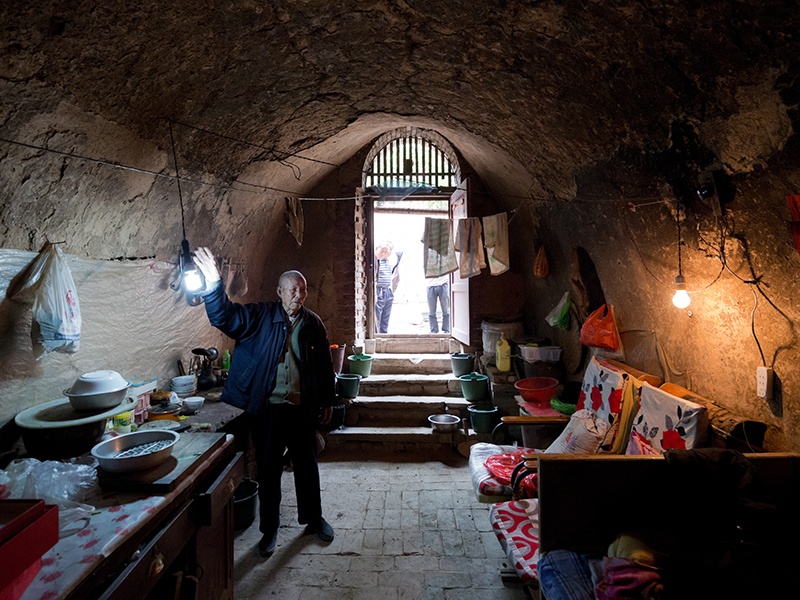 Baan enjoys pushing the boundaries of comfort by visiting locations that subvert his Western upbringing. This image was taken at a home in Sanmenxia, Henan Province in China—thousands of people lived in underground caves here until the early 21st century. Photograph: Iwan Baan.