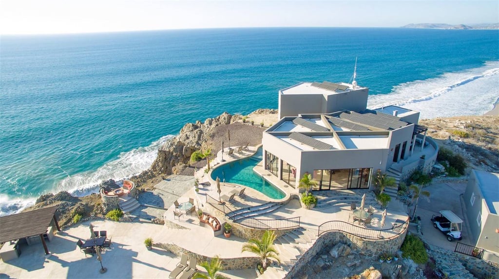 This contemporary oceanfront villa, just outside Cabo San Lucas, was built with locally sourced stone from the Sierra de la Laguna mountains. The home is also 100 percent solar powered. 