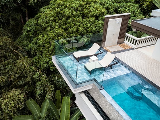 At Trisara, residences and villas sit on a terraced tropical hillside on the shores of the Andaman Sea. Accommodation ranges from suites (pictured) to villas, all in glorious garden settings with private pools and ocean views. Fine-dining restaurant Pru (banner image) overlooks the resort's private beach.