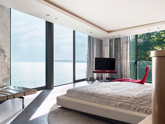 Designed to emphasize its location on Lake Geneva, each of the property’s rooms offers views of the water. Photograph: SPG Finest