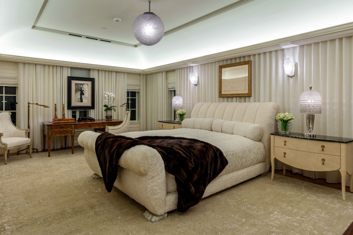 The upstairs master bedroom is a study in subtle Deco influences.